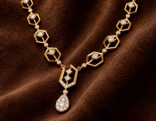 Gold and diamond hexagon necklace with pear-drop pendant